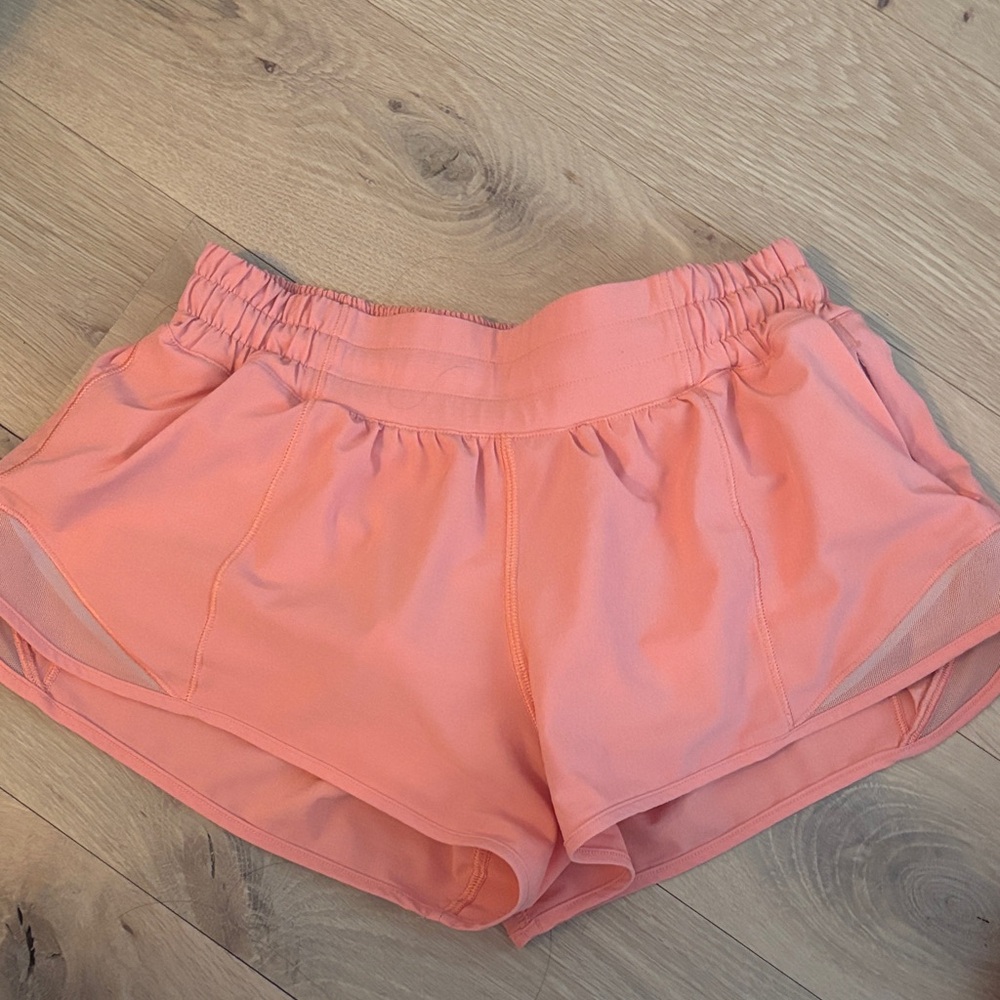 Soft orange-pink lululemon hotty hots size 4